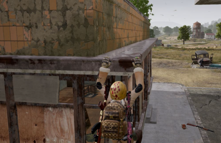 绝地求生如何翻到墙上